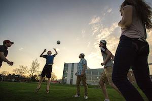 students playing volleyball